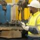 welding operator reviewing equipment