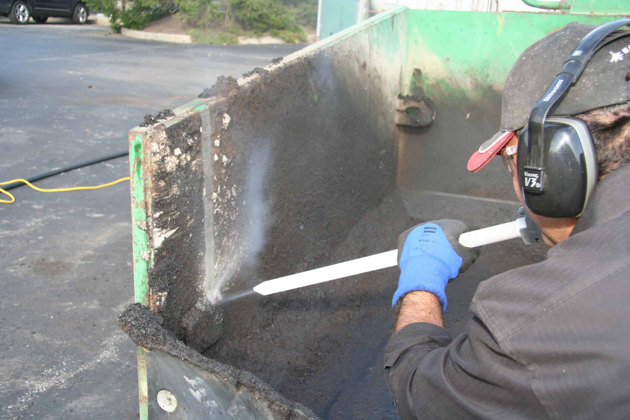 close up of OSC employee using dry ice blasting for cleaning