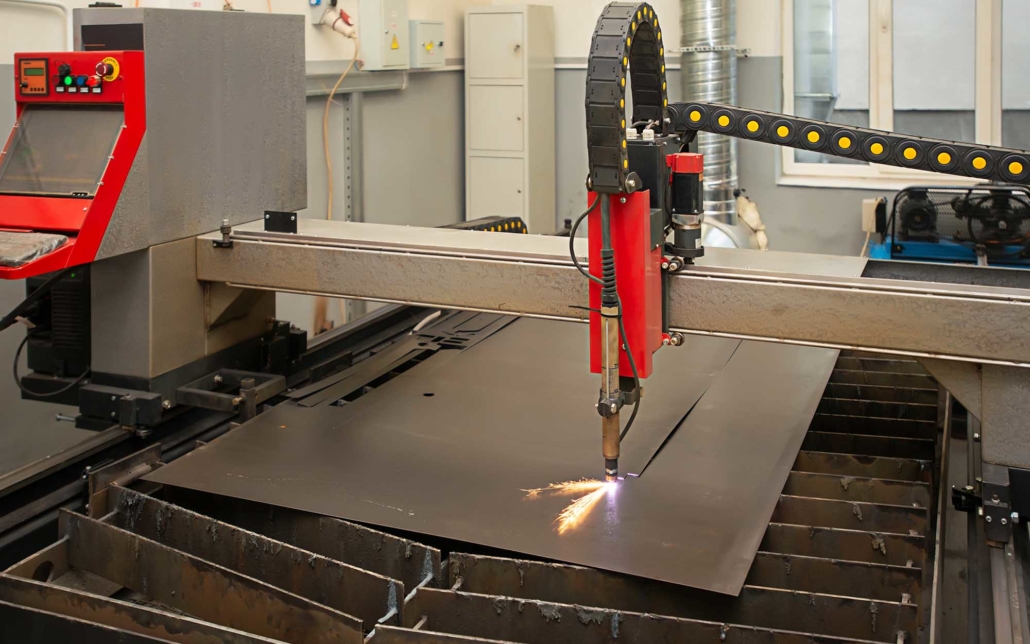 Automated Plasma Cutting machine cutting piece of metal