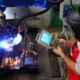 robotic welding operator using machine to determine efficient welding processes
