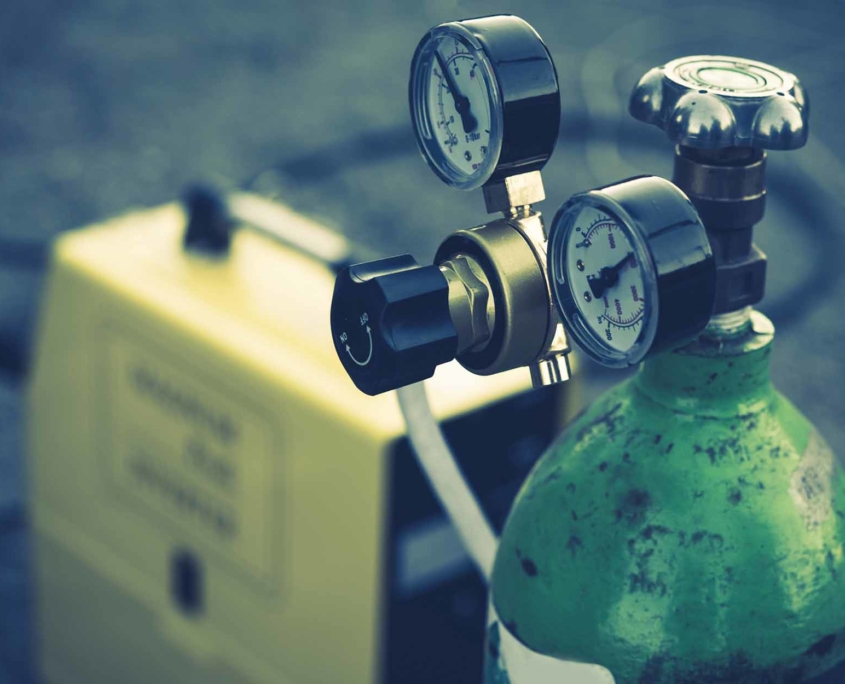 acetylene gas container with knobs and pressure readers